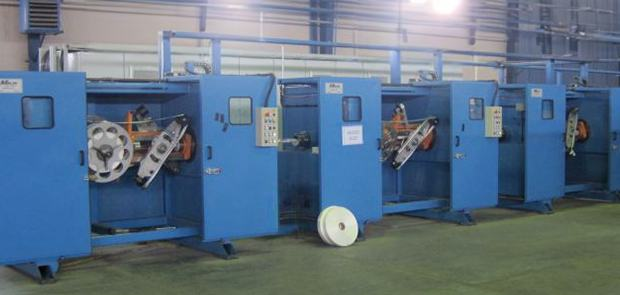 Taping and braiding machine